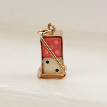 vintage gold boxed dice charm