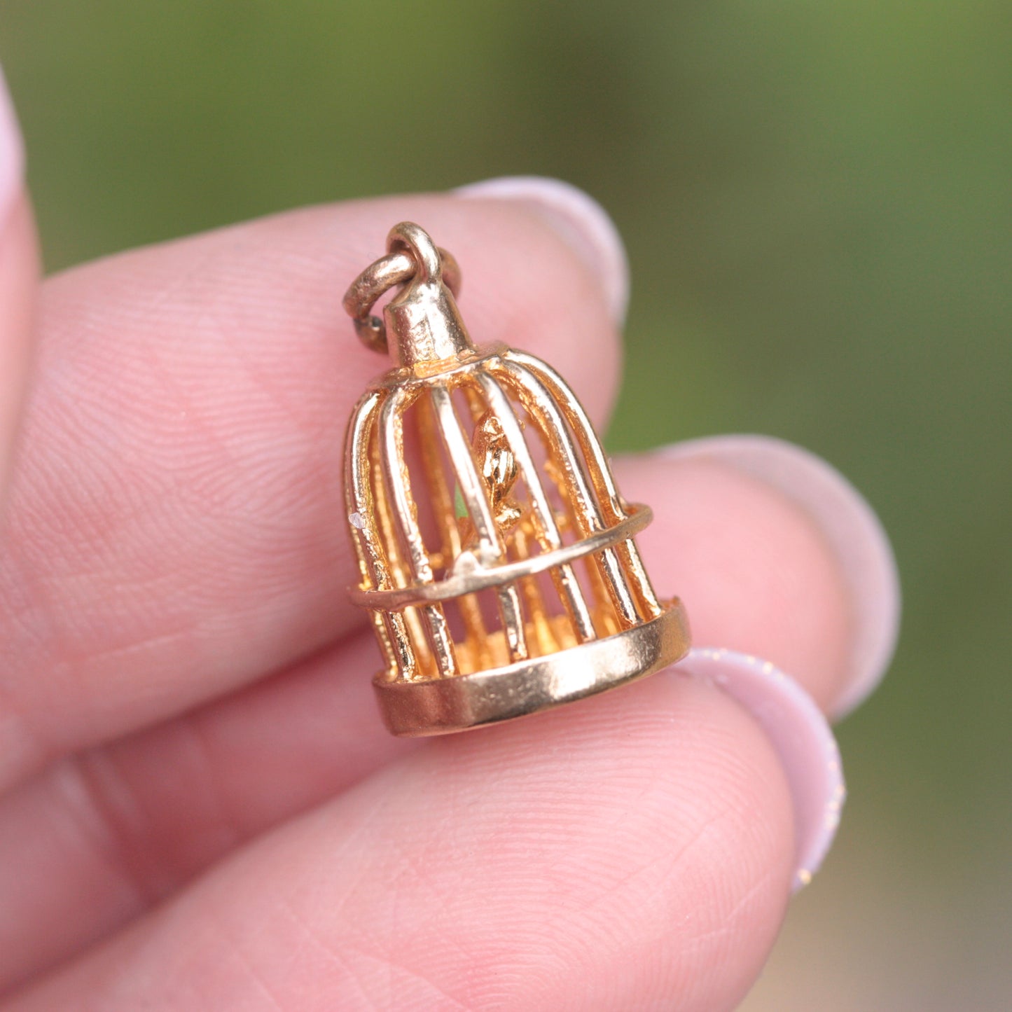 9ct gold and green enamel bird in cage charm
