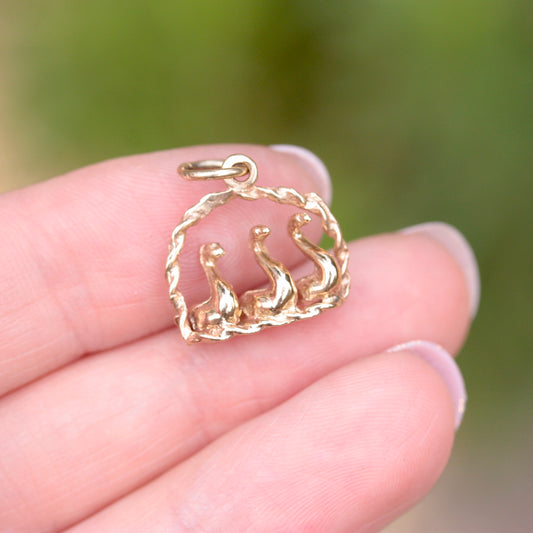 three geese in a basket charm
