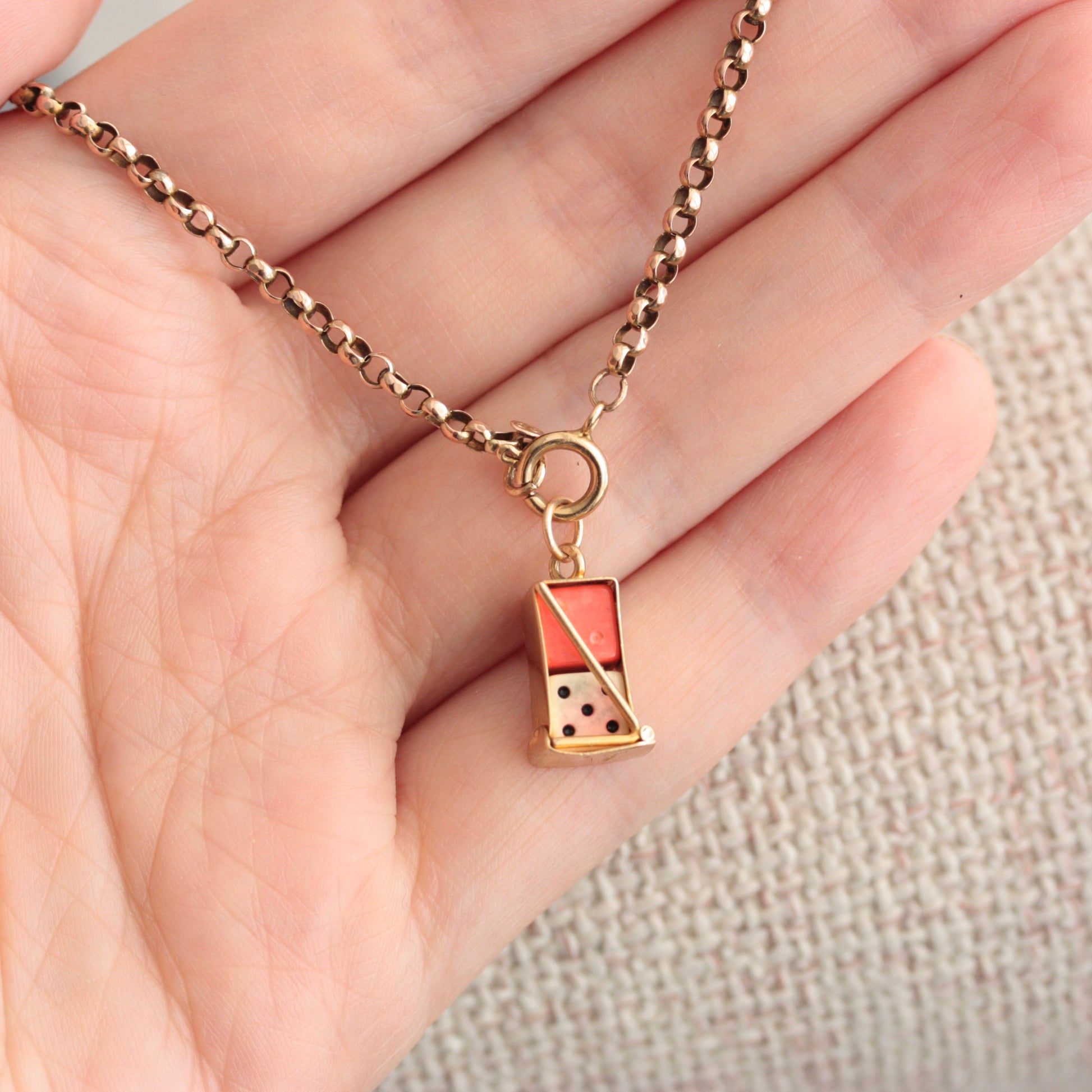 vintage gold caged dice charm