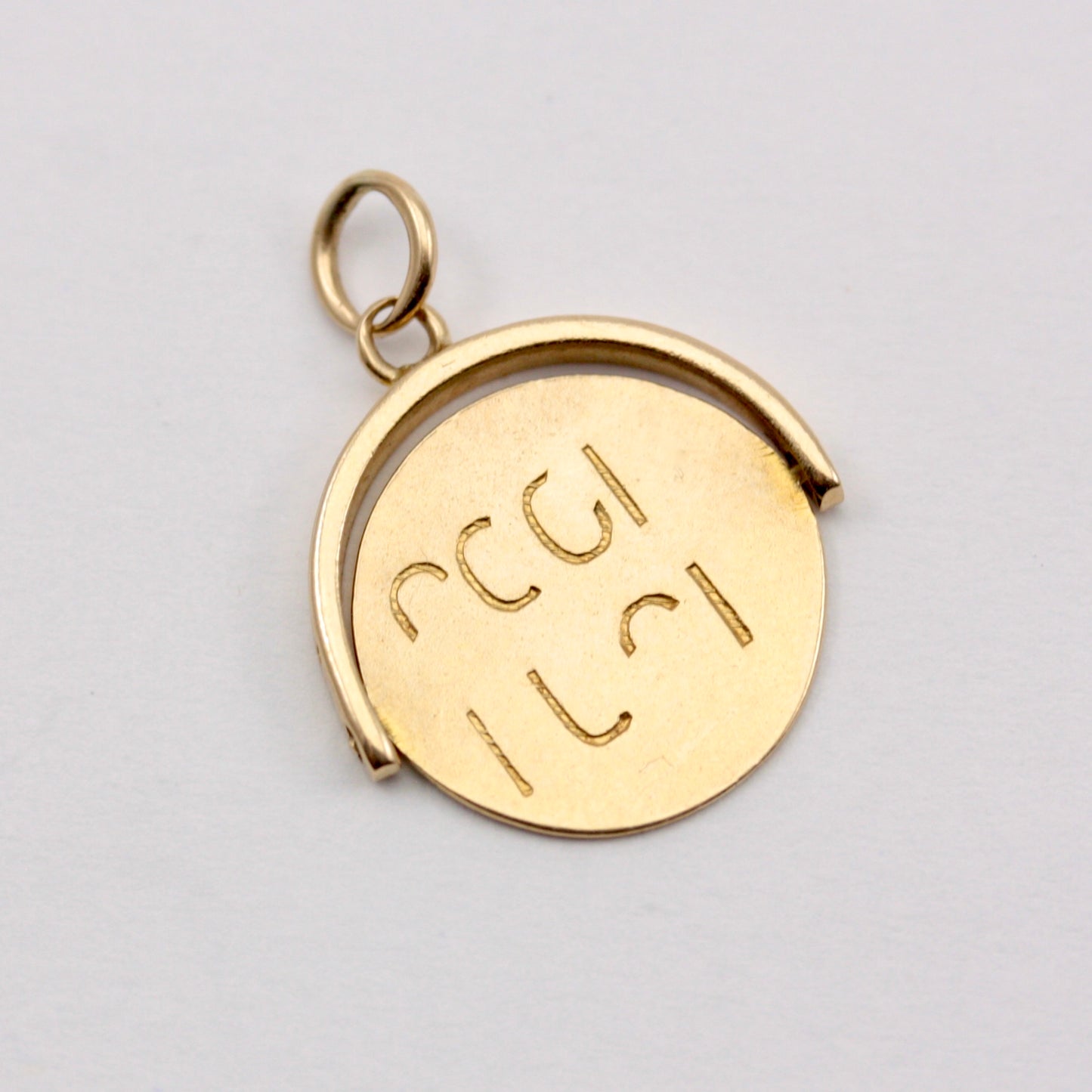 vintage 9ct gold spinning pendant good luck