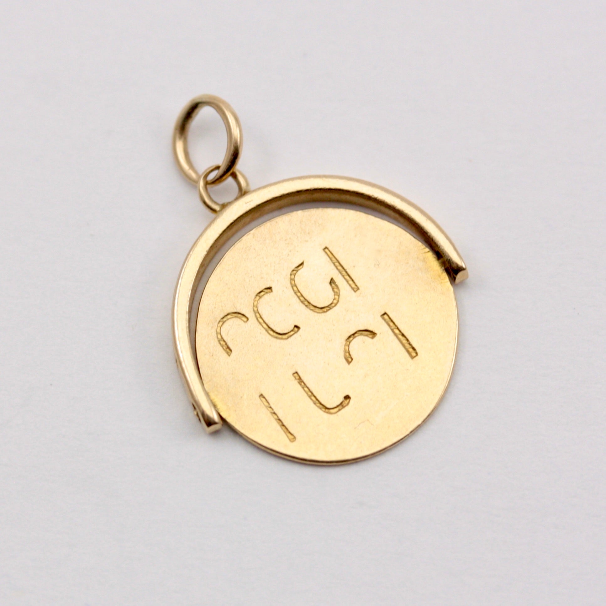 vintage 9ct gold spinning pendant good luck
