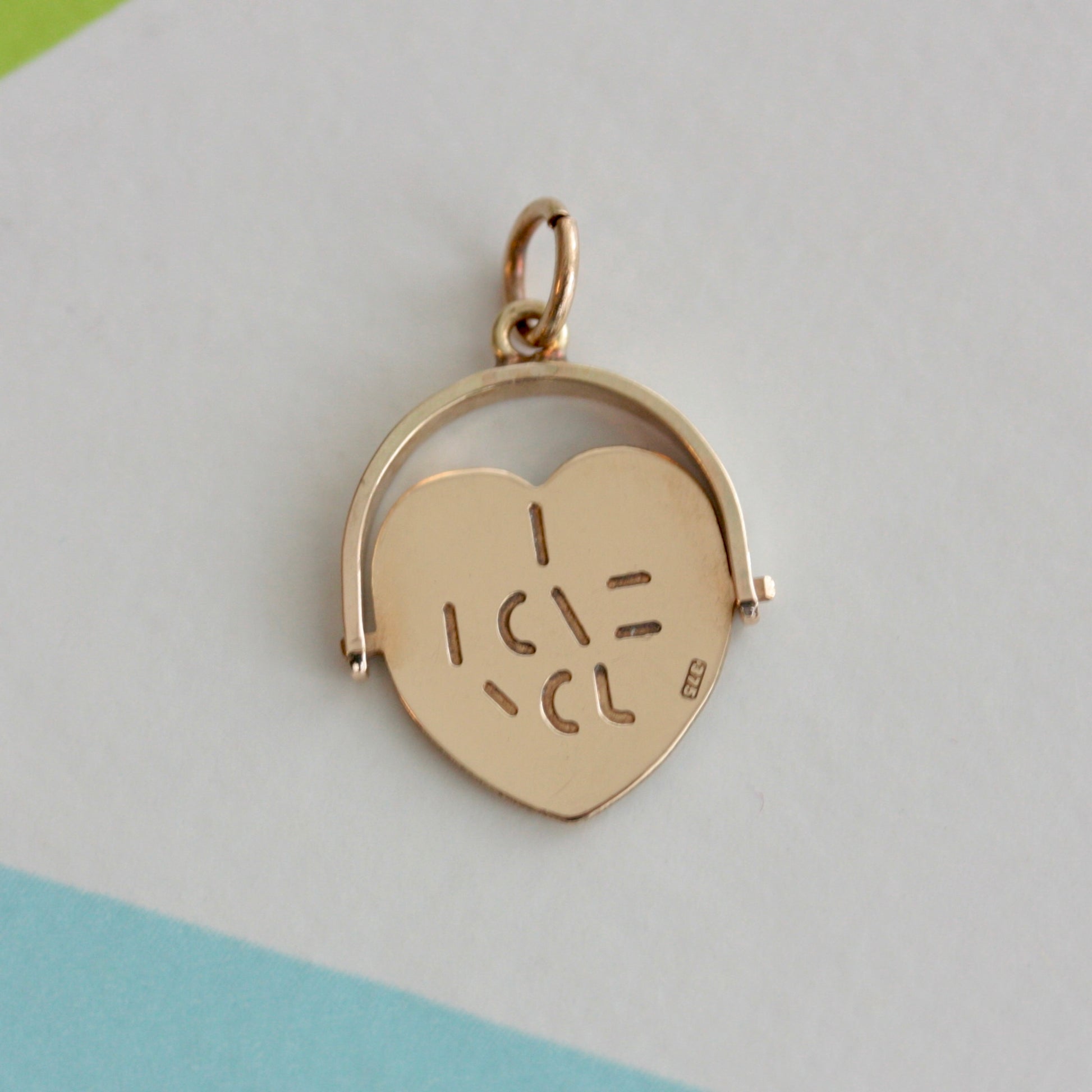 vintage 9ct gold i love you spinner pendant