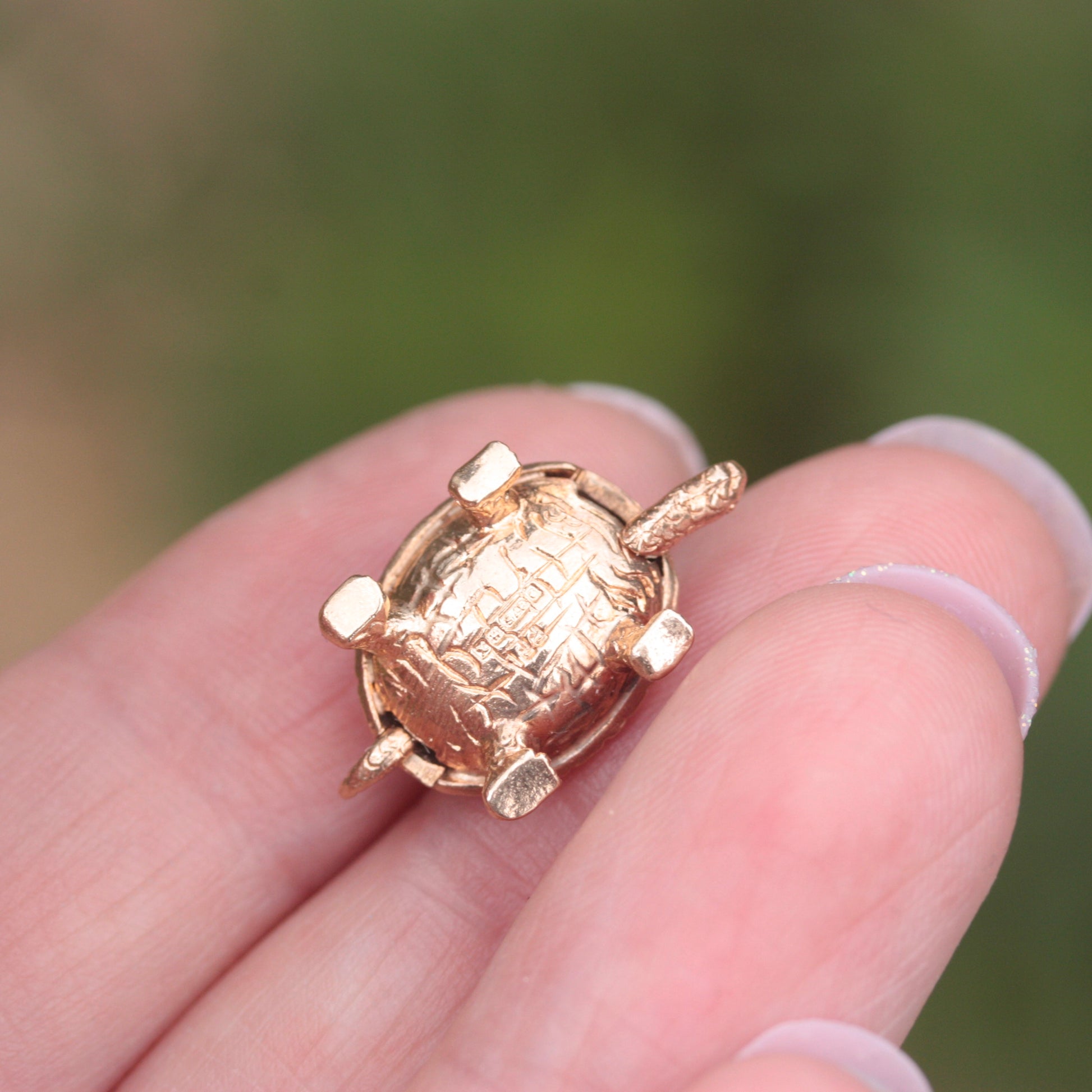 articulated gold tortoise charm