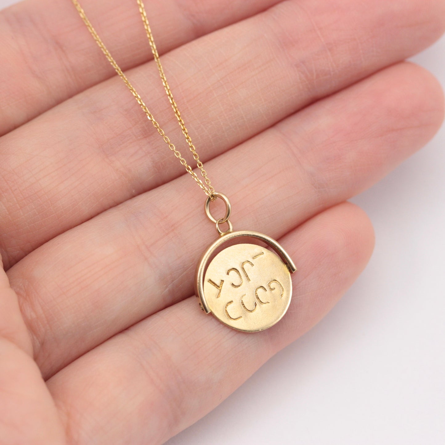 vintage 9ct gold spinning pendant good luck